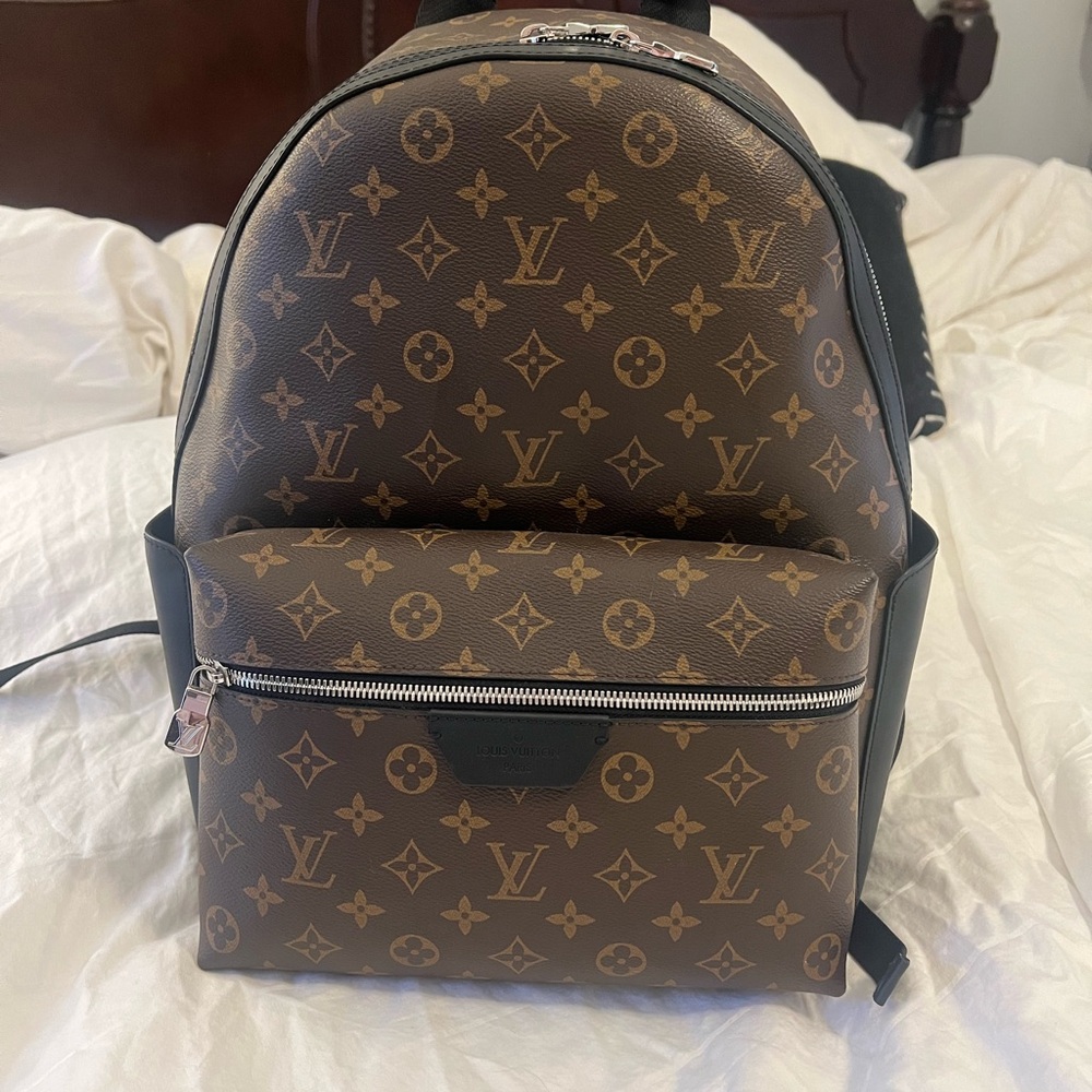 Louis Vuitton Discovery Backpack Monogram  Canvas, pre-owned like new. Authentic